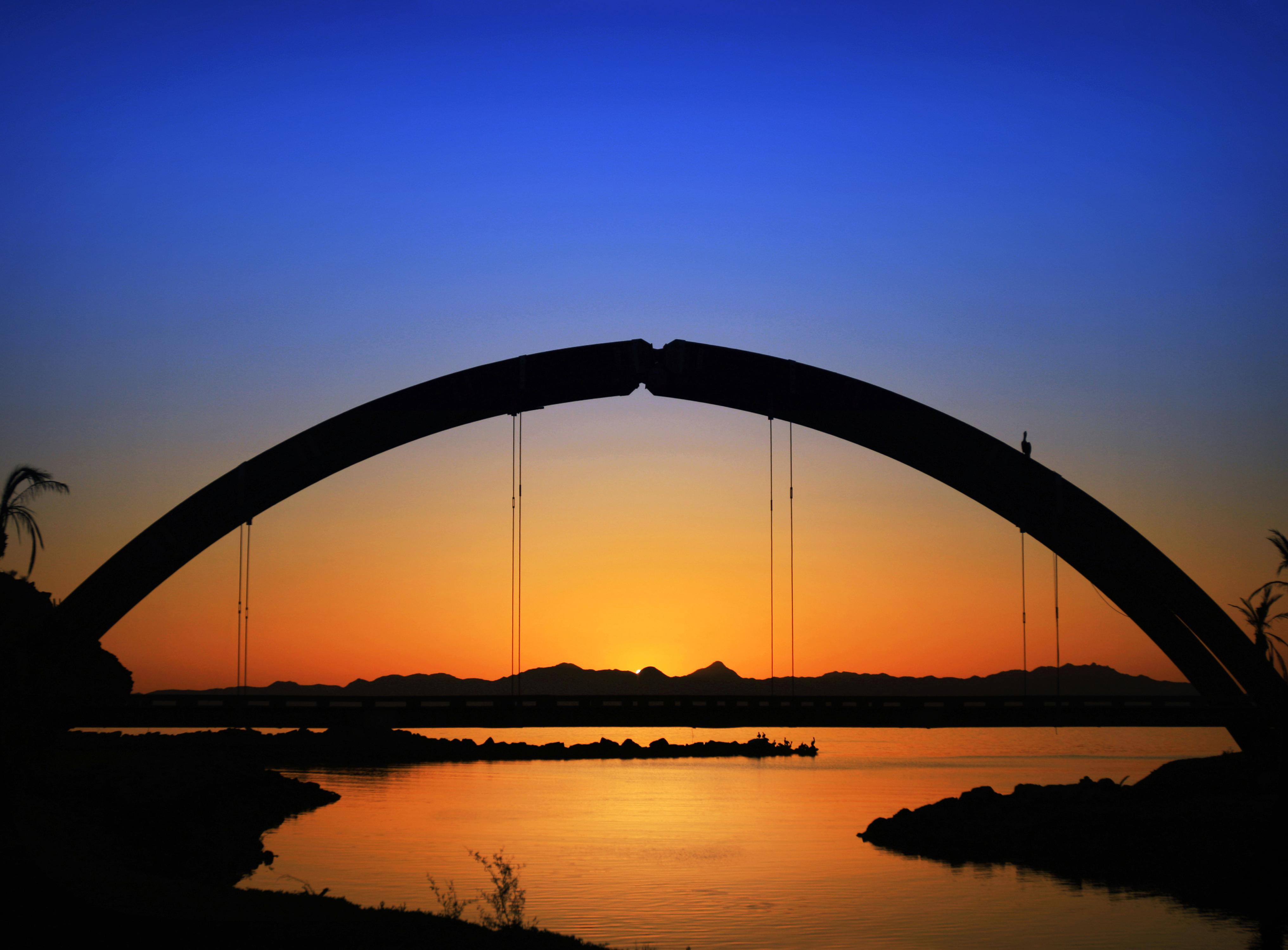 Loreto Bay Golf Resort & Spa At Baja Exterior photo Sunset at the Rainbow Bridge